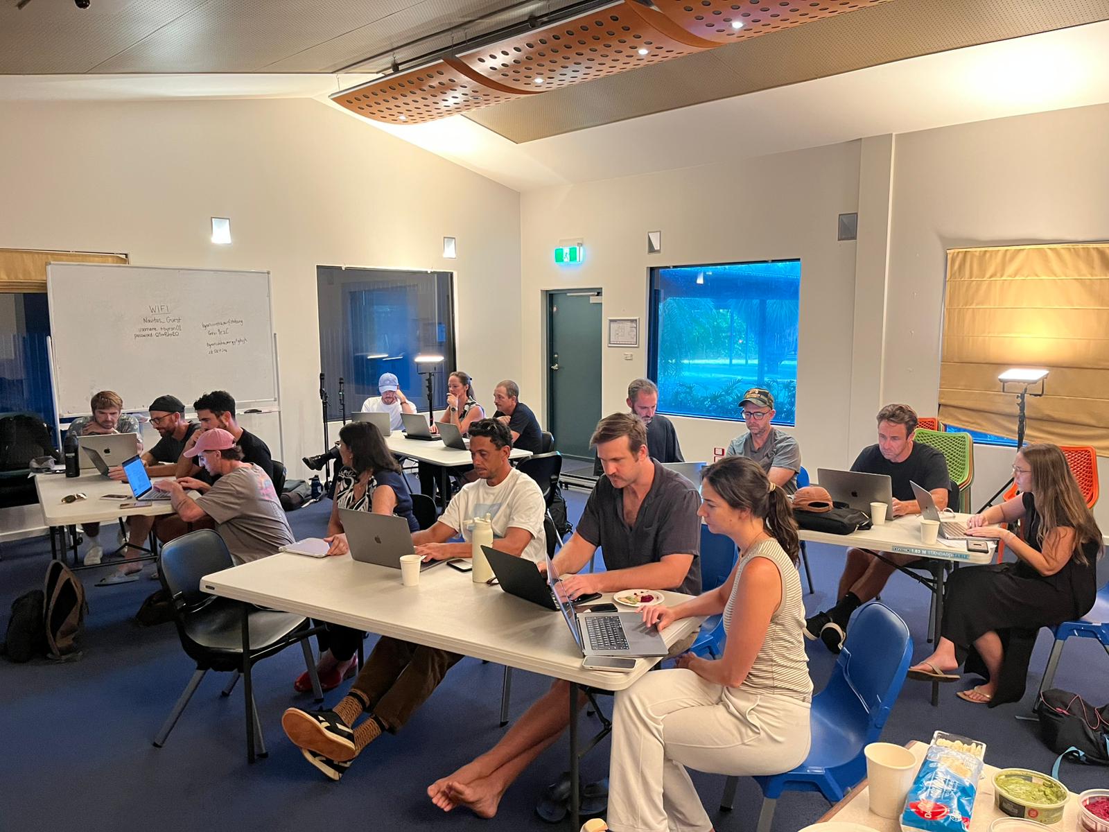 Participants working on laptops during the Hands-On Agentic AI with Claude Code Builder workshop.