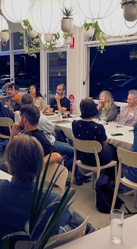 Participants exchange ideas during an interactive AI workshop hosted by The Remix.