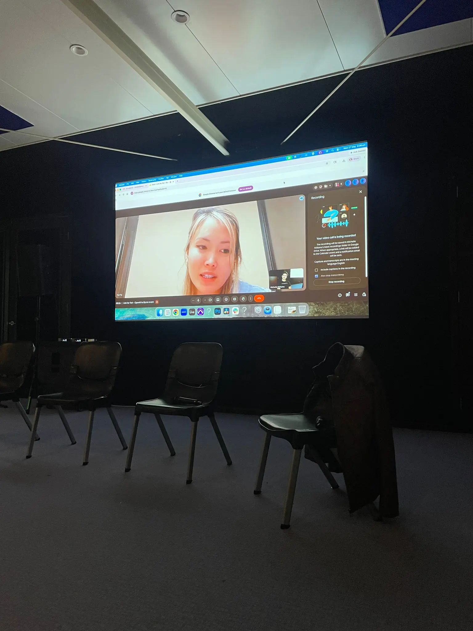 OpenAI speaker Teri Yu streamed live onto a large screen for The Remix audience in Byron.